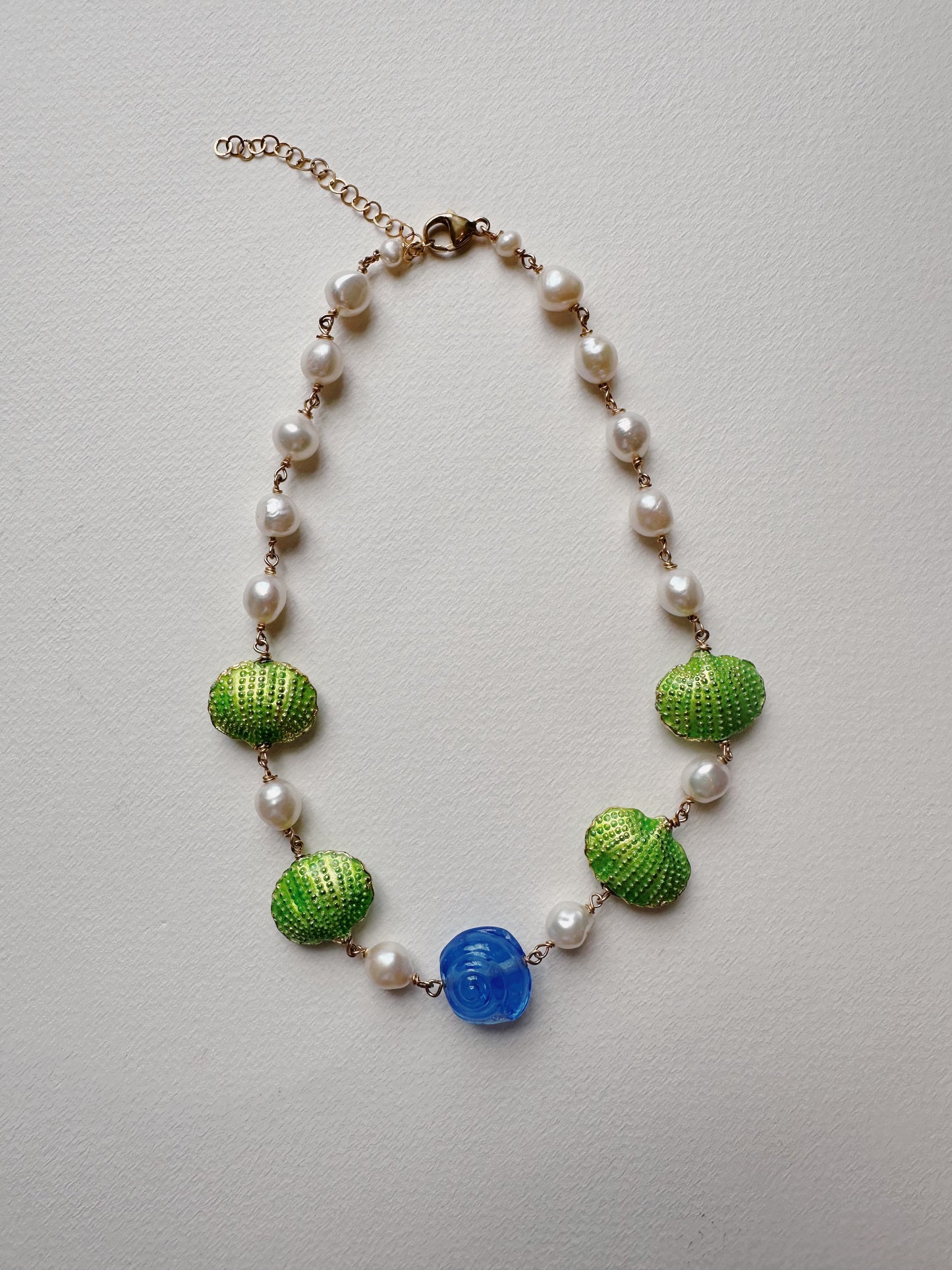 Cloisonné and glass shell layer