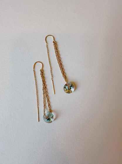 Glass Donut Threaders: 14k gold filled chain earrings with handblown multicolored glass donut beads and two thin dangling chains, shown against a plain white background.